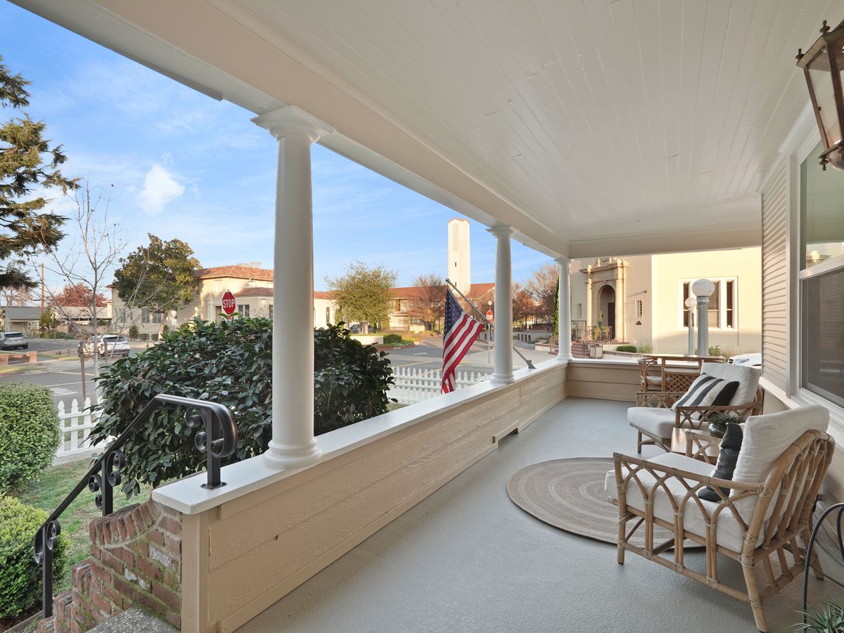 Wraparound porch of a managed short-term rental in Lodi