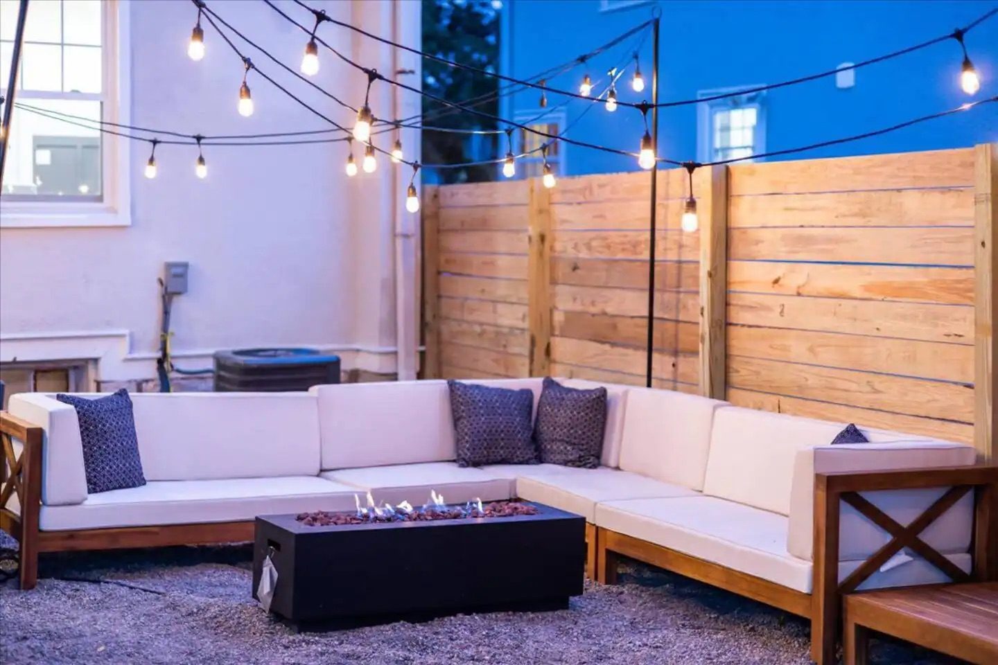 Outdoor lounge with string lights — Kansas City